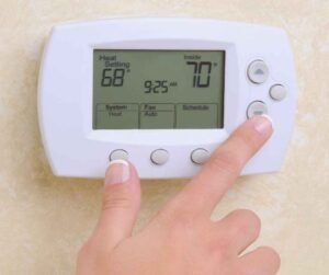 Thermostat on the wall of a home